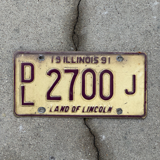 Photo of a 1991 Illinois Dealer License Plate Auto Tag 1 Vintage Garage 2700 J with original patina