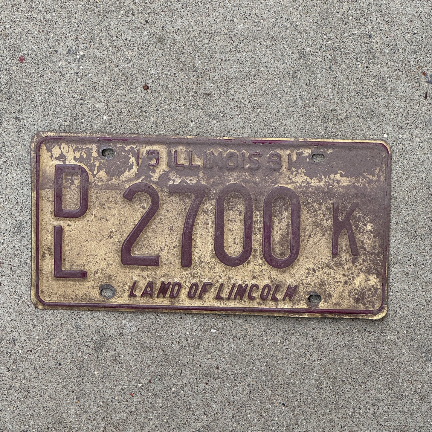 Photo of a 1991 Illinois Dealer License Plate Auto Tag 1 Vintage Garage 2700 K with original patina