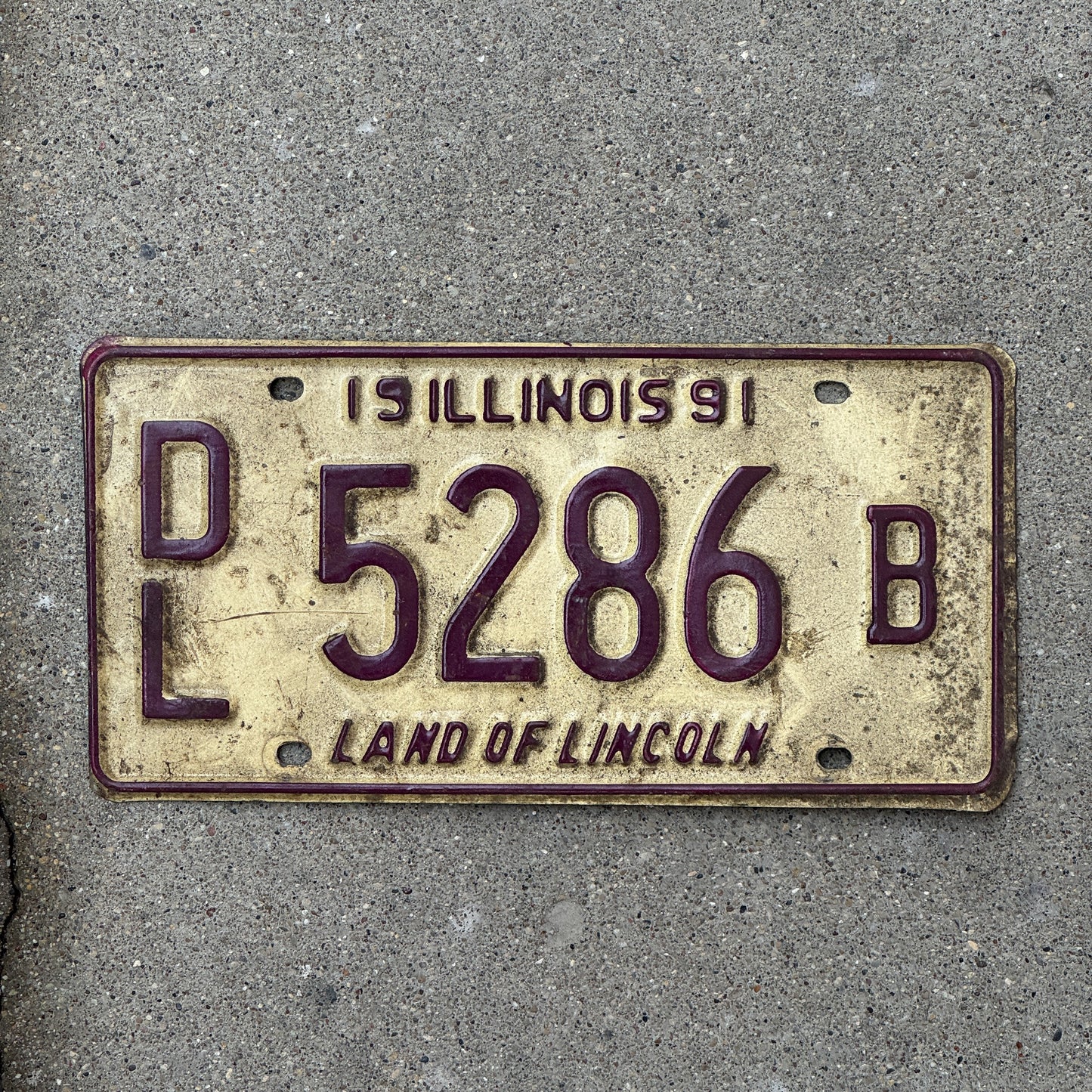 Photo of a 1991 Illinois Dealer License Plate Auto Tag 1 Vintage Garage 5286 B with original patina