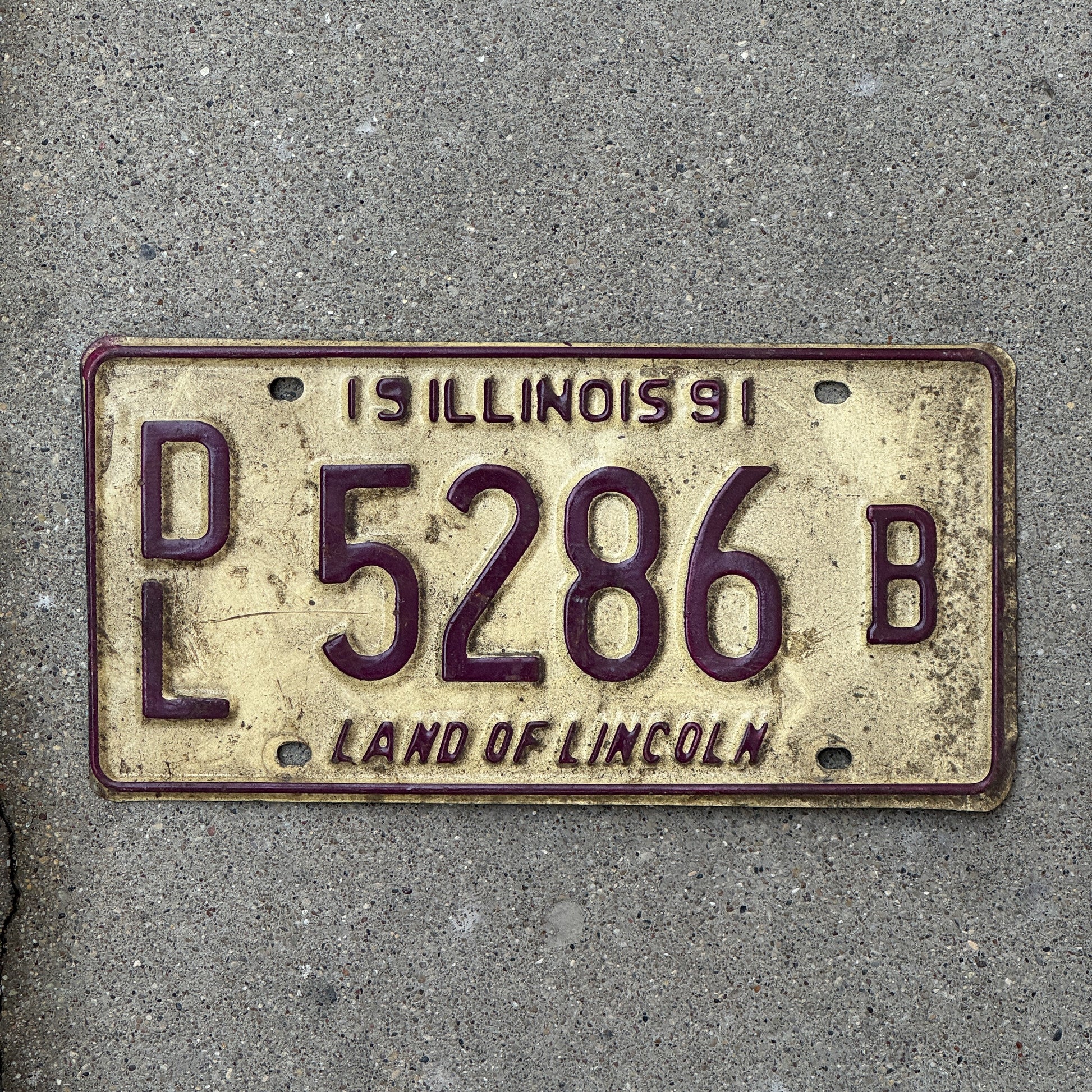 Photo of a 1991 Illinois Dealer License Plate Auto Tag 1 Vintage Garage 5286 B with original patina