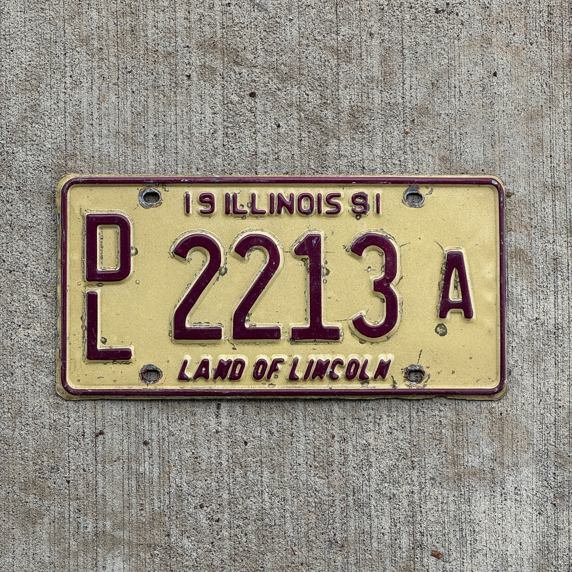 Photo of a 1991 Illinois Dealer License Plate Auto Tag 2 Vintage Garage 2213 A with original patina