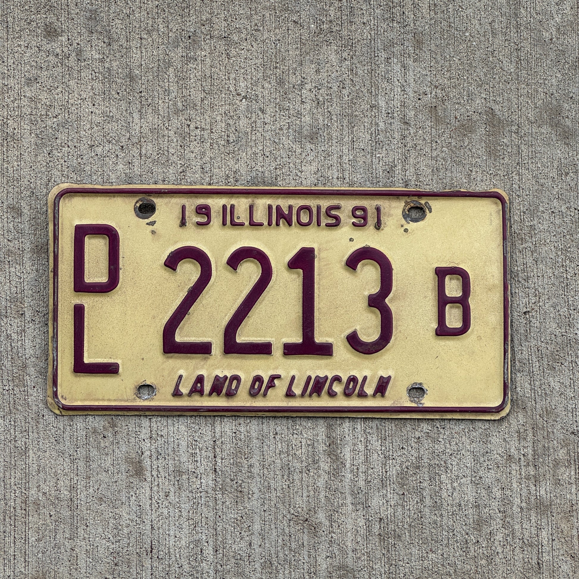 Photo of a 1991 Illinois Dealer License Plate Auto Tag 2 Vintage Garage 2213 B with original patina