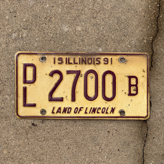 Photo of a 1991 Illinois Dealer License Plate Auto Tag 2 Vintage Garage 2700 B with original patina