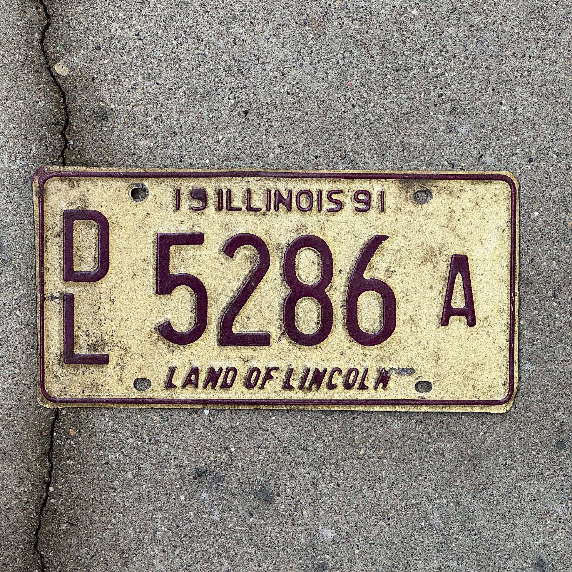 Photo of a 1991 Illinois Dealer License Plate Auto Tag 2 Vintage Garage 5286 A with original patina