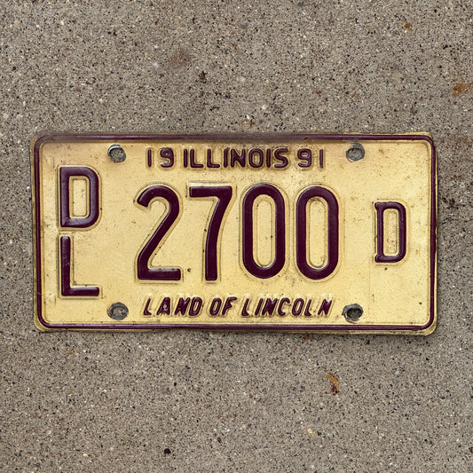 Photo of a 1991 Illinois Dealer License Plate Auto Tag Garage Decor Vintage 2700 D with original patina