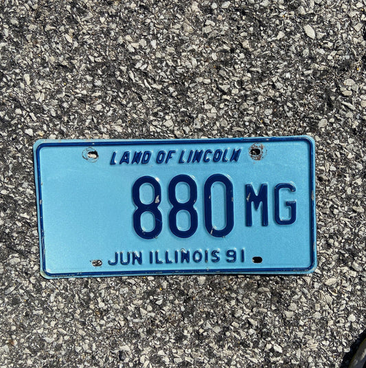 Photo of a 1991 Illinois Truck Mileage Tax License Plate Auto Tag 1 Garage Decor Low Number 880 MG
