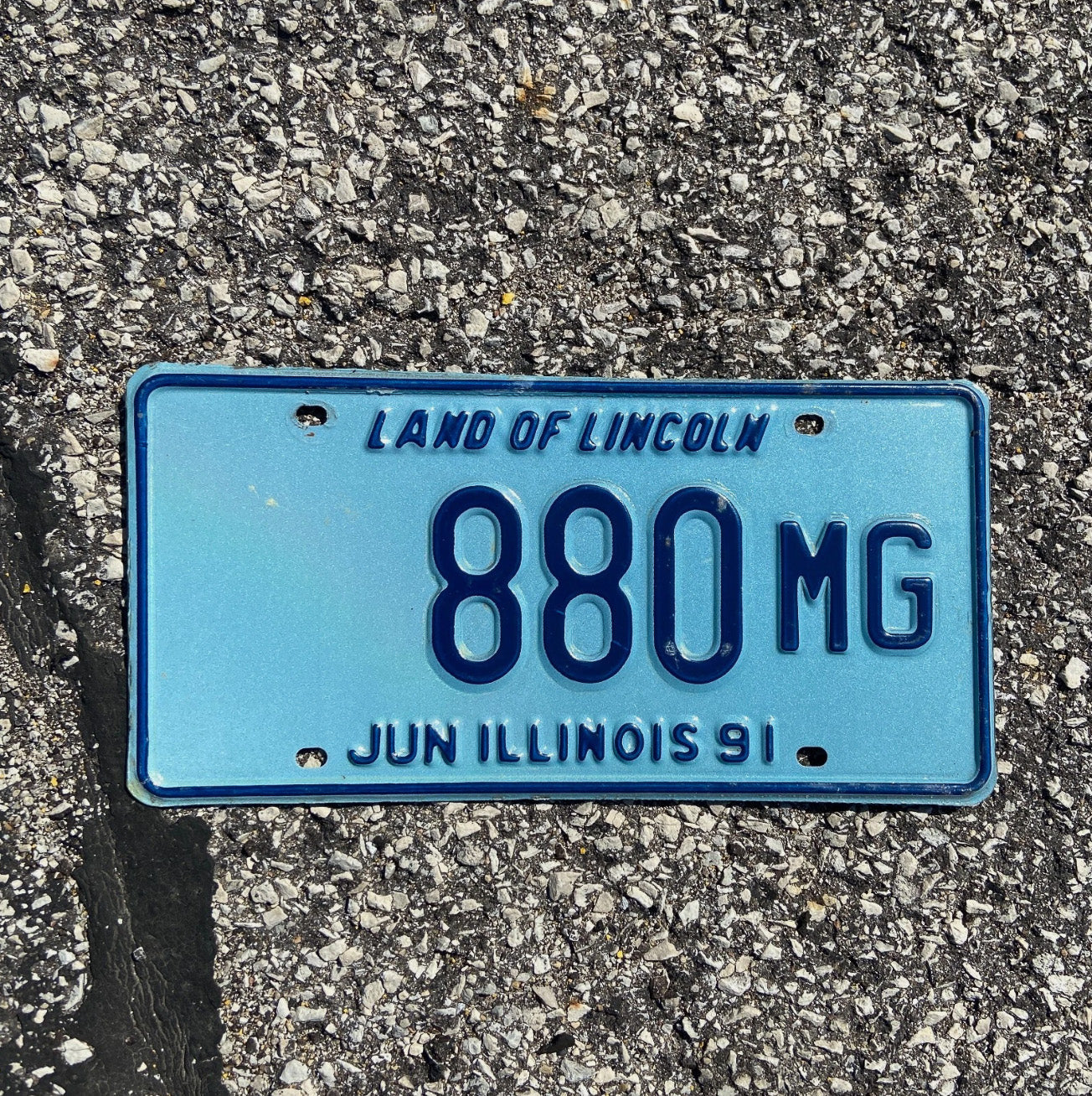 Photo of a 1991 Illinois Truck Mileage Tax License Plate Auto Tag 2 Garage Decor Low Number 880 MG