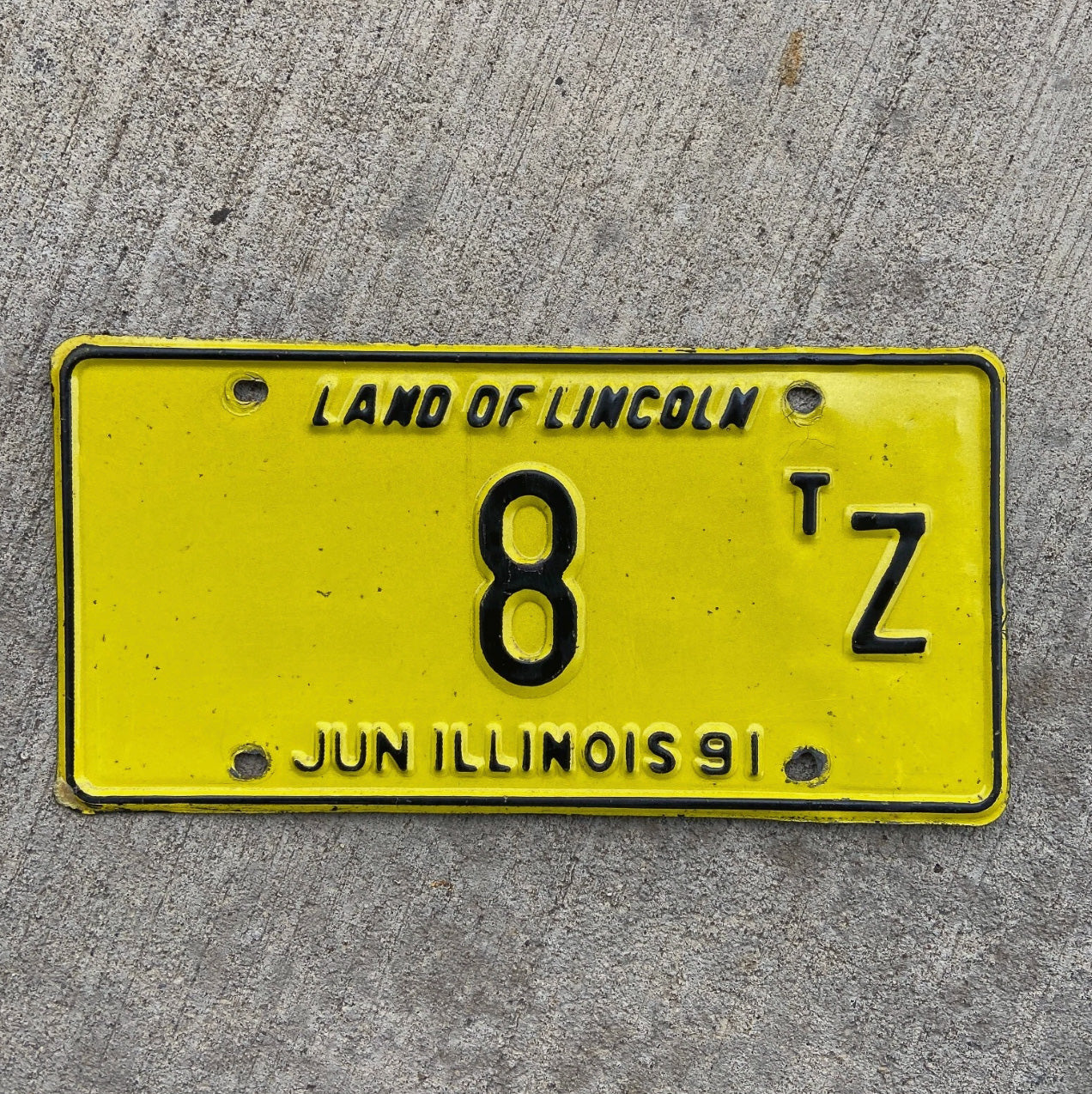 Photo of a 1991 Illinois Truck Tractor License Plate Auto Tag Garage Decor Vintage Low Number Single Digit 8 TZ with original patina
