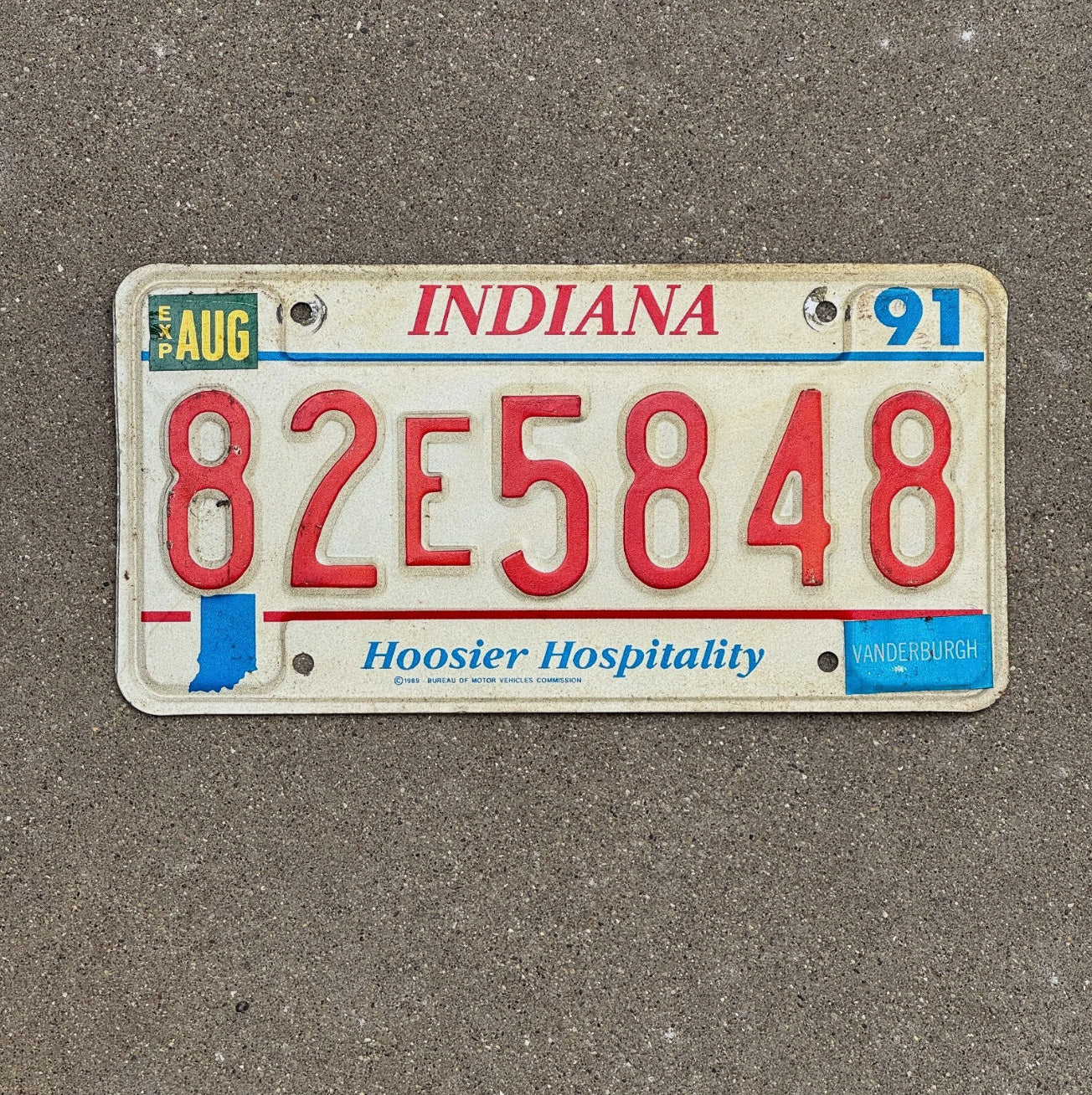 Photo of a 1991 Indiana License Plate Auto Tag Garage Decor 82 E 5848