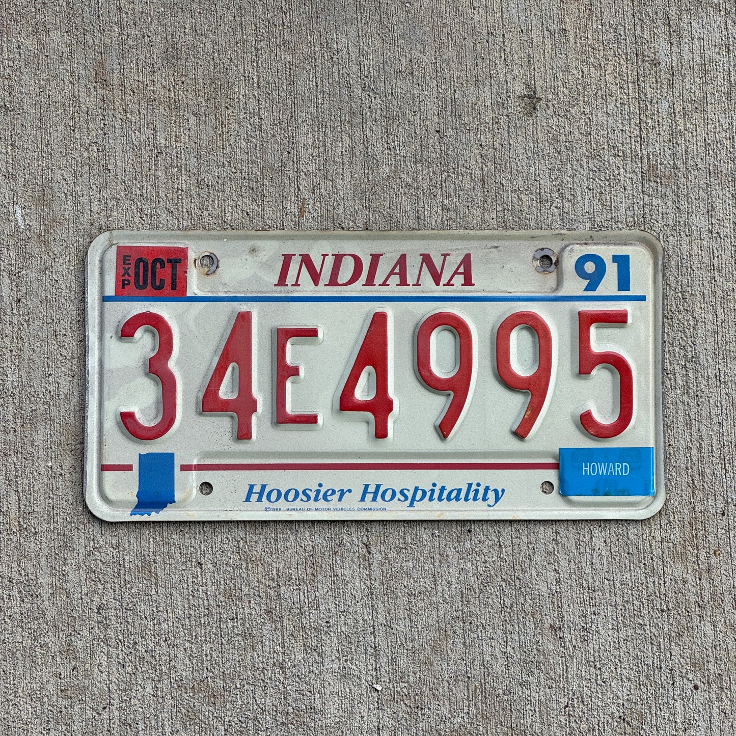 Photo of a 1991 Indiana License Plate Auto Tag Garage Decor Vintage 34 E 4995 with original patina