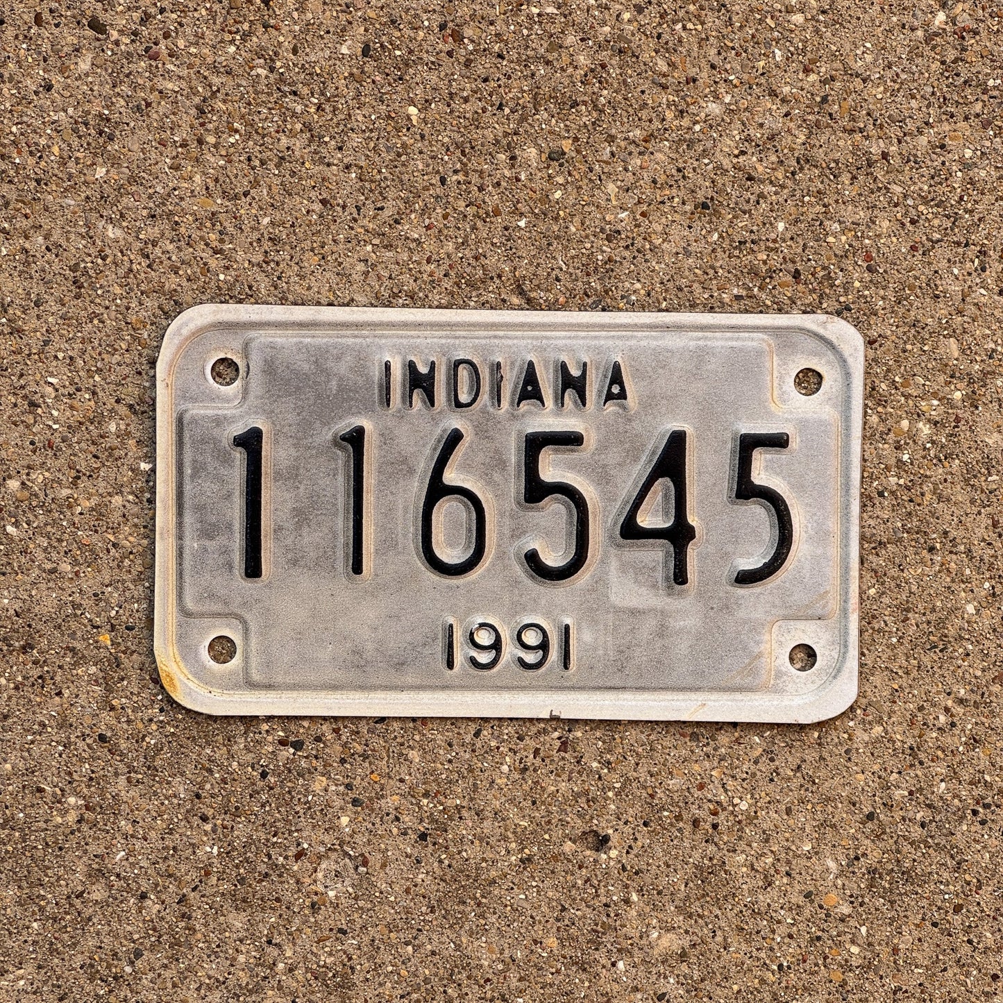 Photo of a 1991 Indiana MOTORCYCLE License Plate Auto Tag Garage Decor Vintage 116545