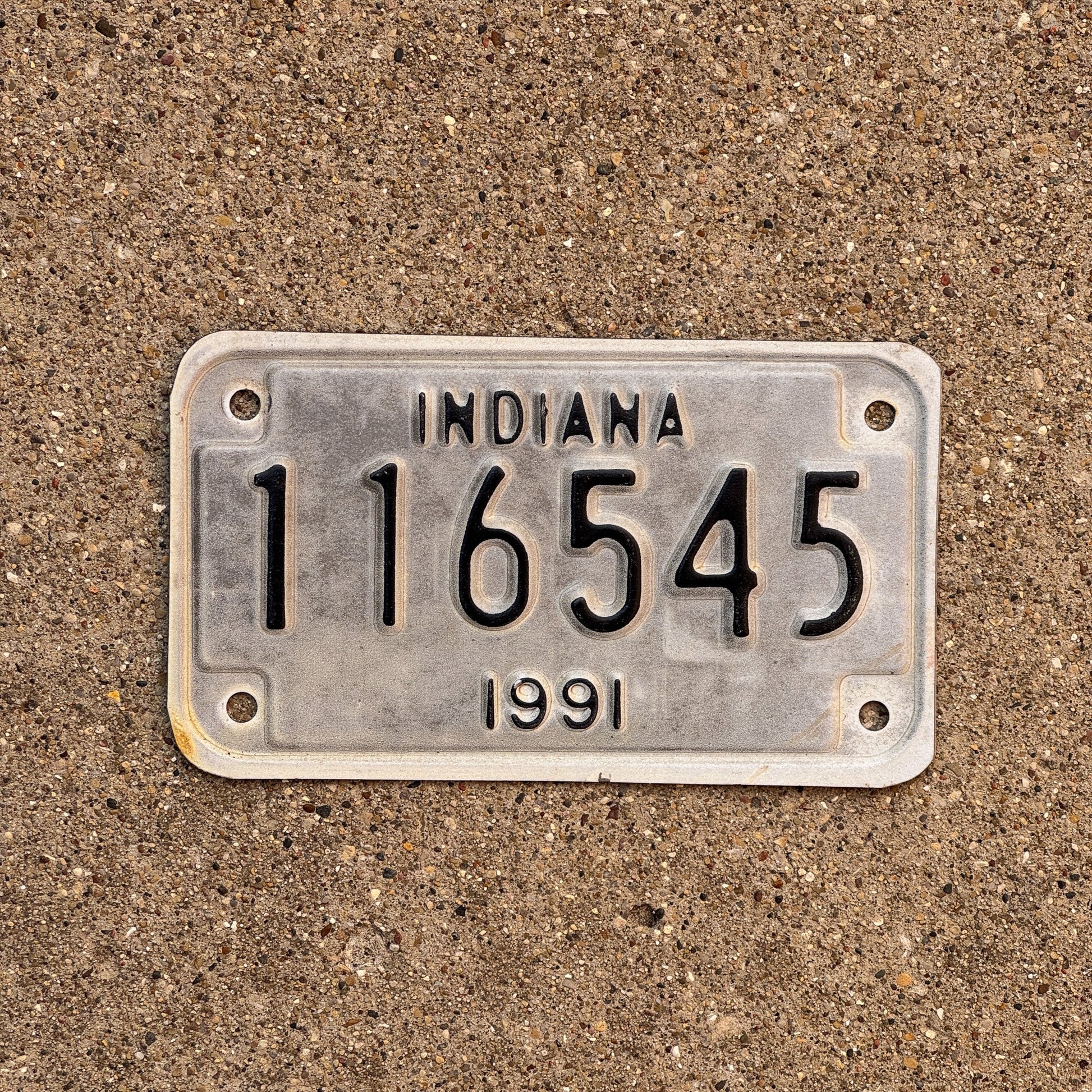 Photo of a 1991 Indiana MOTORCYCLE License Plate Auto Tag Garage Decor Vintage 116545