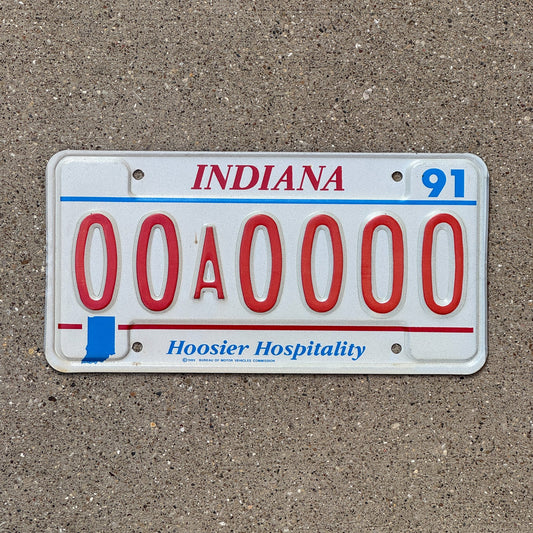 Photo of a 1991 Indiana Sample License Plate Auto Tag 4 Vintage 00A0000 with original patina