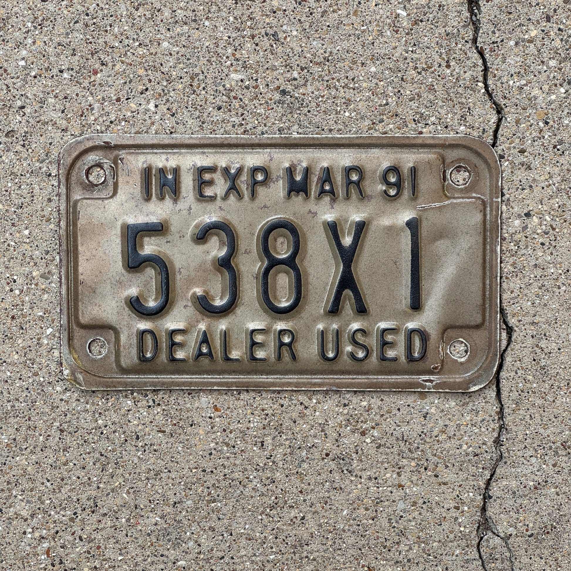 Photo of a 1991 Indiana Used Motorcycle Dealer License Plate Auto Tag Garage Decor Vintage 538 X 1 with original patina