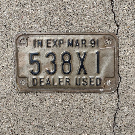 Photo of a 1991 Indiana Used Motorcycle Dealer License Plate Auto Tag Garage Decor Vintage 538 X 1 with original patina