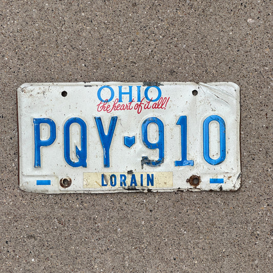 Photo of a 1991 Ohio License Plate Auto Tag 2 Vintage Garage PQY 910 with original patina