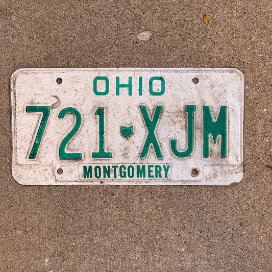 Photo of a 1991 Ohio License Plate Auto Tag Garage Decor Vintage 721 XJM with original patina