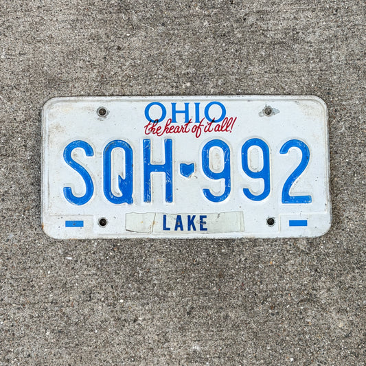 Photo of a 1991 Ohio License Plate Auto Tag Garage Decor Vintage SQH 992 with original patina