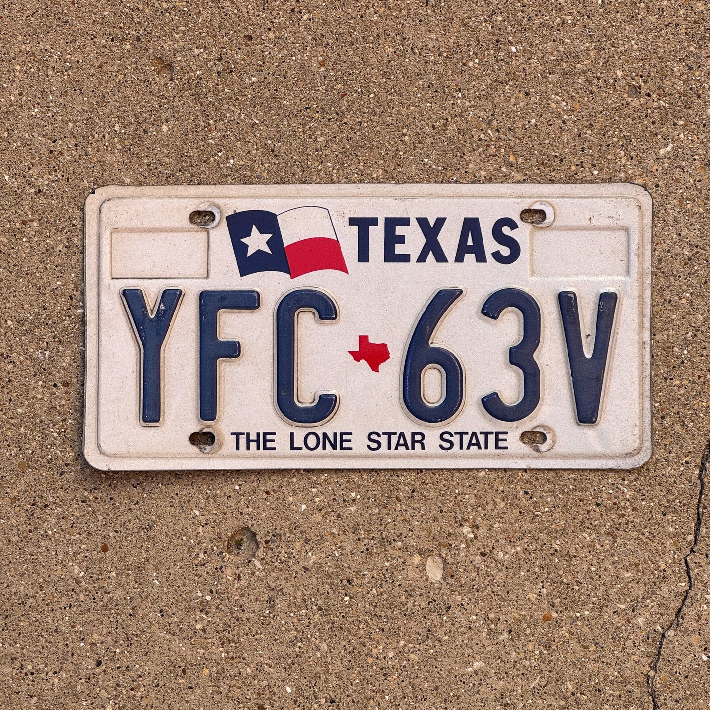 Photo of a 1991 Texas License Plate Auto Tag Garage Decor Vintage YFC 63V