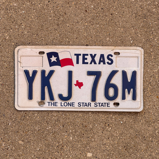 Photo of a 1991 Texas License Plate Auto Tag Garage Decor Vintage YKJ 76M