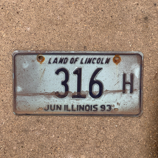 Photo of a 1992 1993 Illinois Truck License Plate Auto Tag 1 Vintage Garage 316 H with original patina