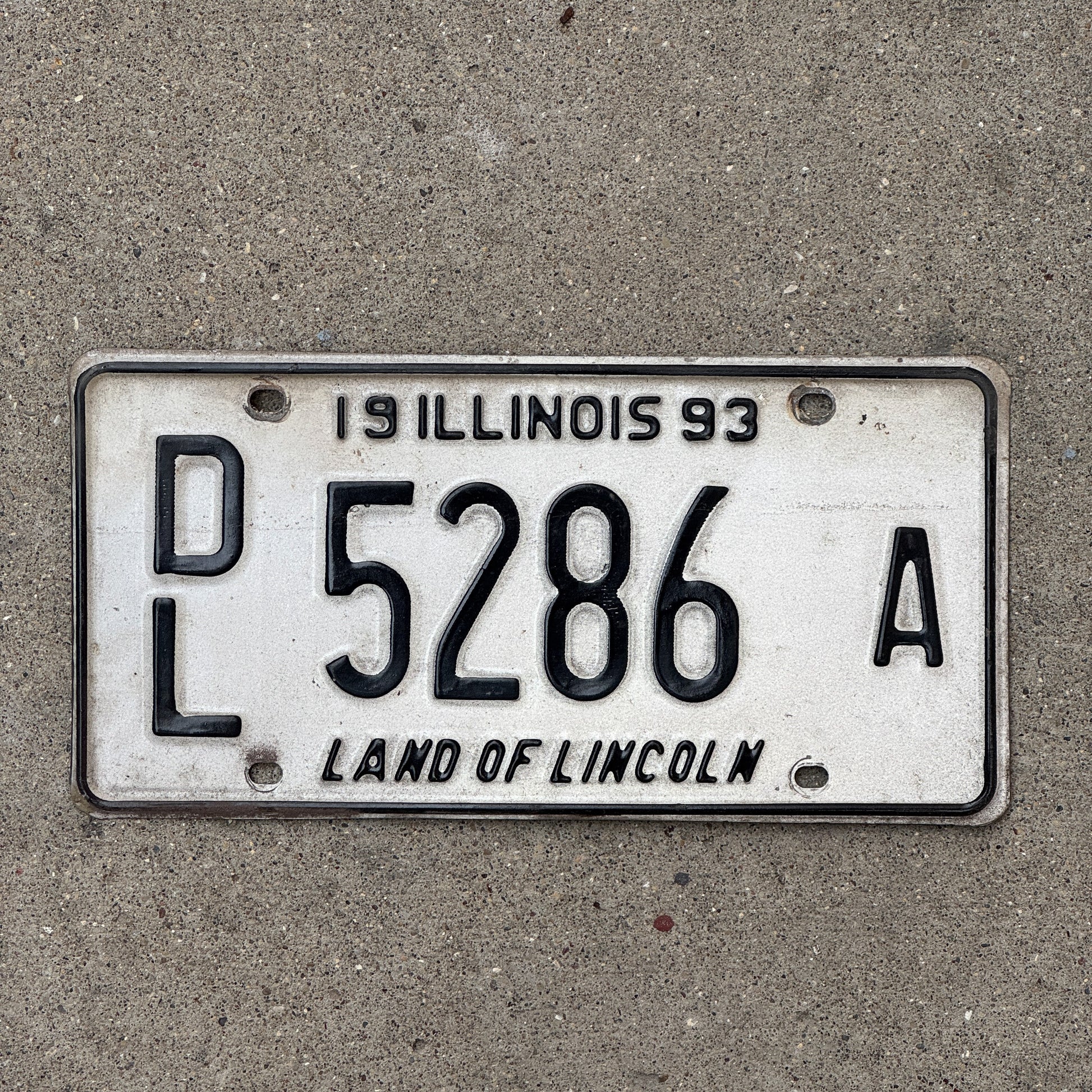 Photo of a 1992 1993 Illinois Truck License Plate Auto Tag 2 Vintage Garage 5286 A with original patina