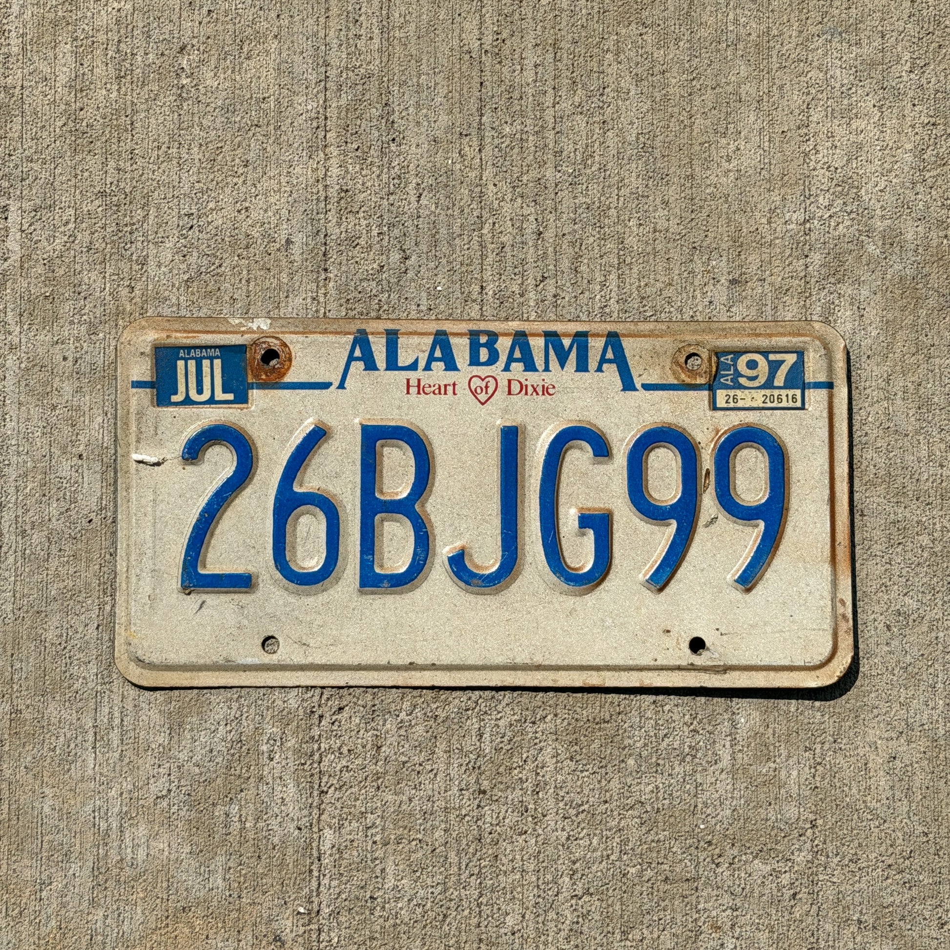 Photo of a 1992 1997 Alabama License Plate Auto Tag Garage Decor Vintage 26 BJG 99 with original patina