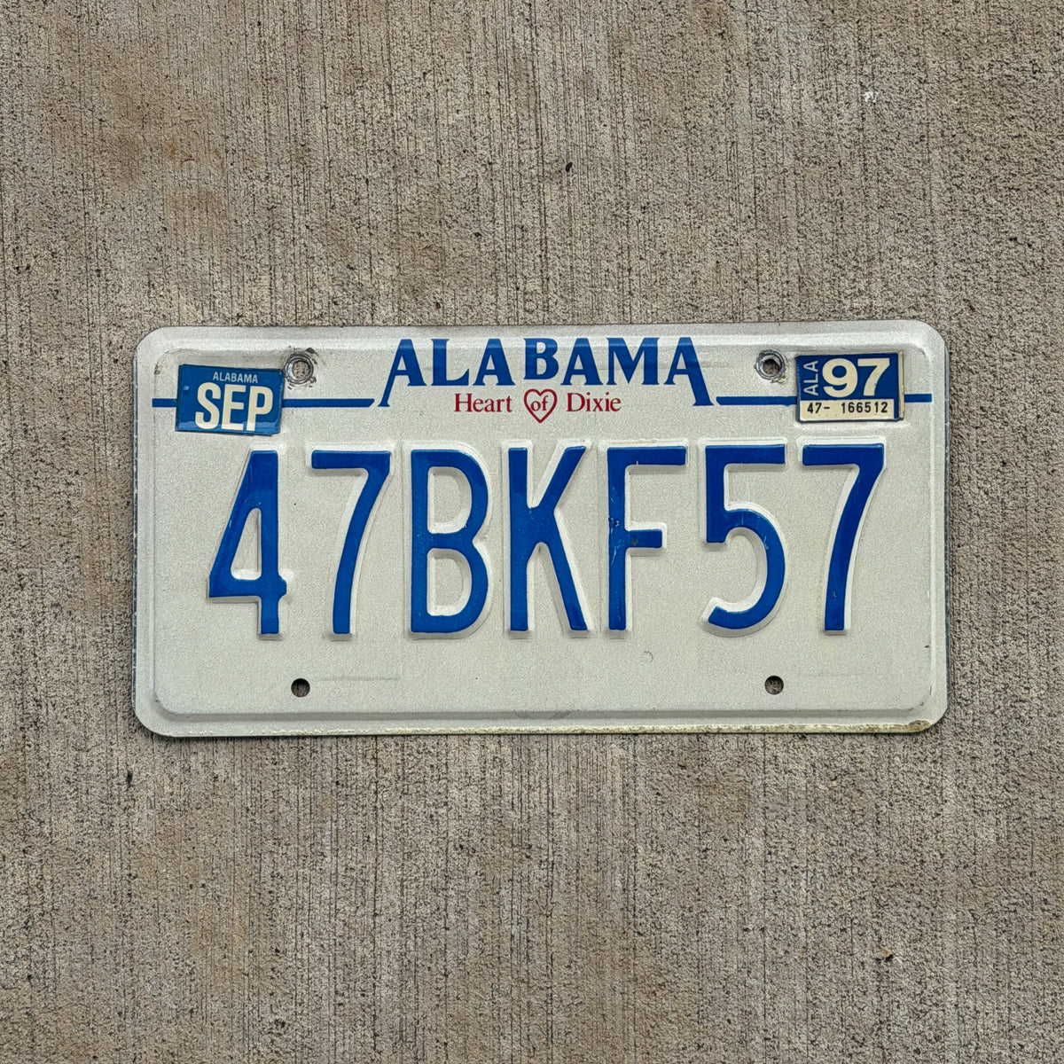 Photo of a 1992 1997 Alabama License Plate Auto Tag Garage Decor Vintage 47 BKF 57 with original patina