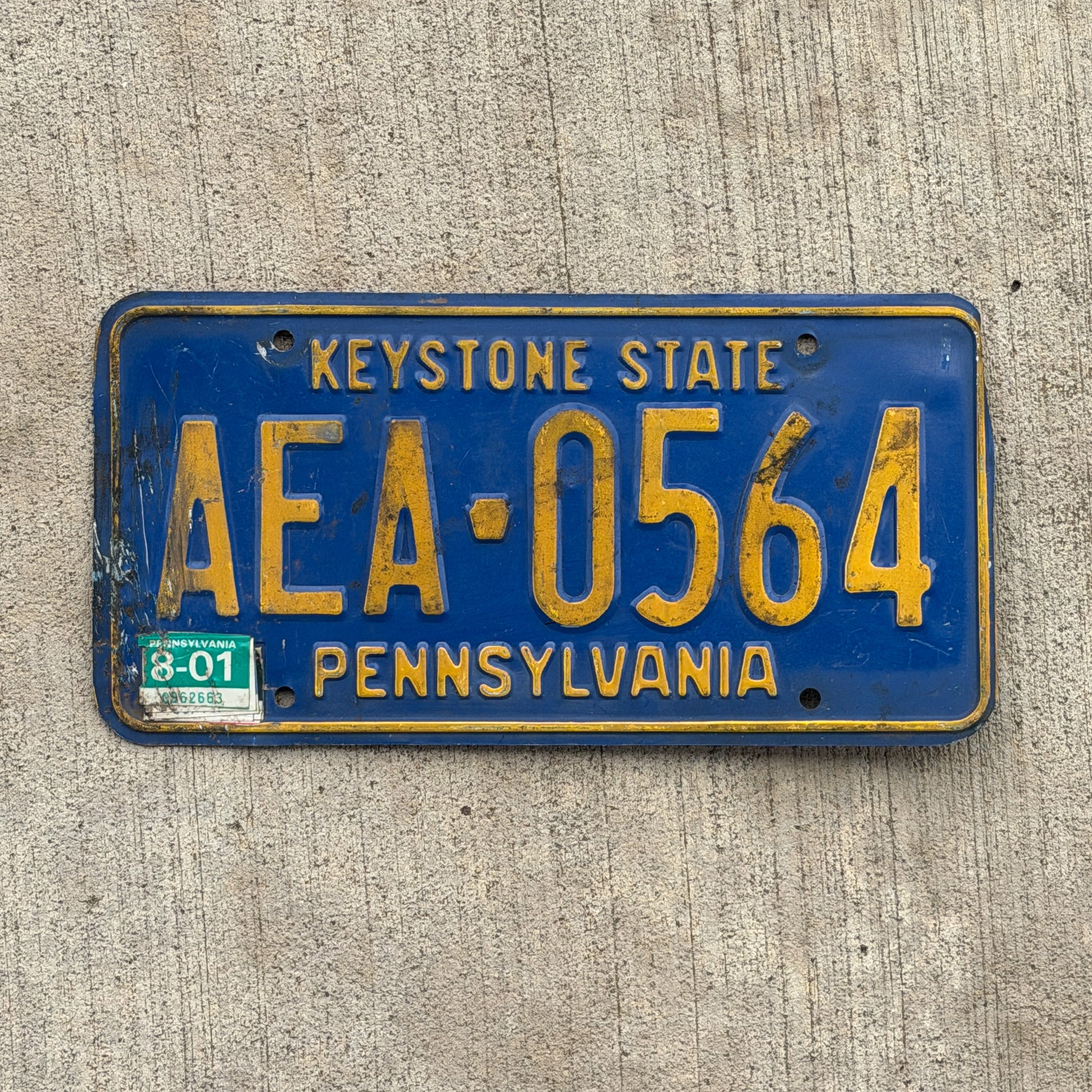 Photo of a 1992 2001 Pennsylvania License Plate Auto Tag Garage Decor Vintage AEA 0564 with original patina