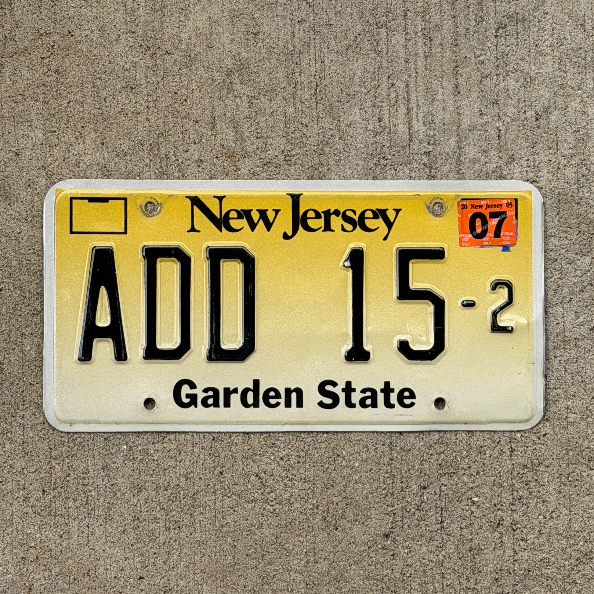Photo of a 1992 2007 New Jersey Courtesy License Plate Auto Tag Garage Decor Vintage Atlantic County ADD 15 2 with original patina