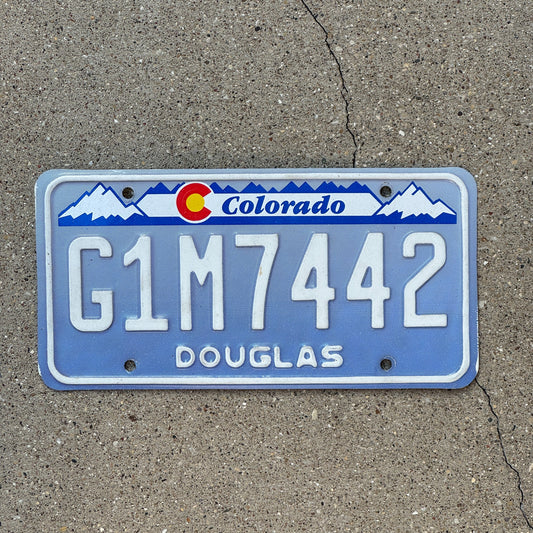 Photo of a 1992 Colorado Denim License Plate Auto Tag 2 Garage Decor Designer Base G1M 7442