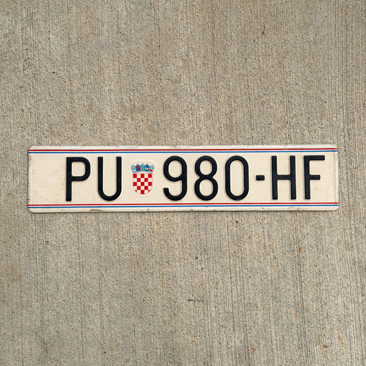 Photo of a 1992 Croatia License Plate Auto Tag Garage Decor Vintage Pula PU 980 HF with original patina