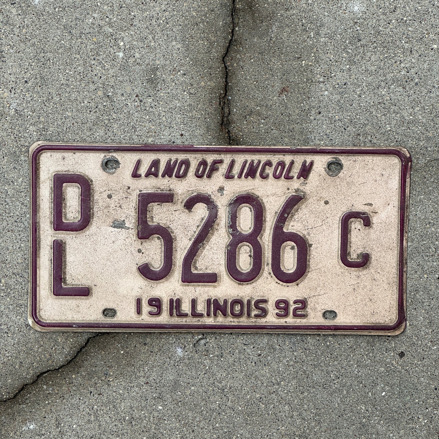 Photo of a 1992 Illinois Dealer License Plate Auto Tag 1 Vintage Garage 5286 C with original patina