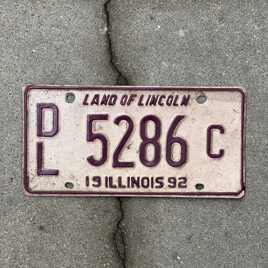 Photo of a 1992 Illinois Dealer License Plate Auto Tag 2 Vintage Garage 5286 C with original patina