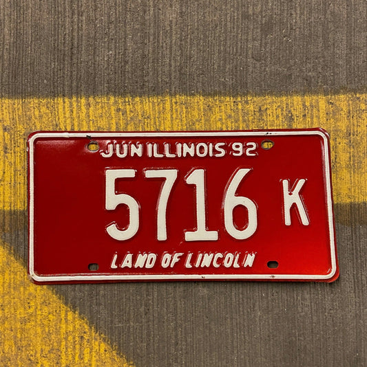 Photo of a 1992 Illinois Truck License Plate Auto Tag Garage Decor Vintage 5716 K with original patina