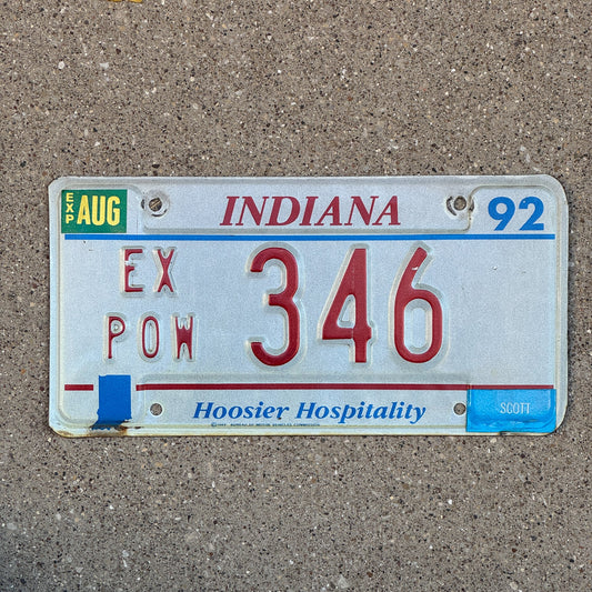 Photo of a 1992 Indiana Ex Prisoner of War License Plate Auto Tag Garage Decor Vintage POW 346 with original patina