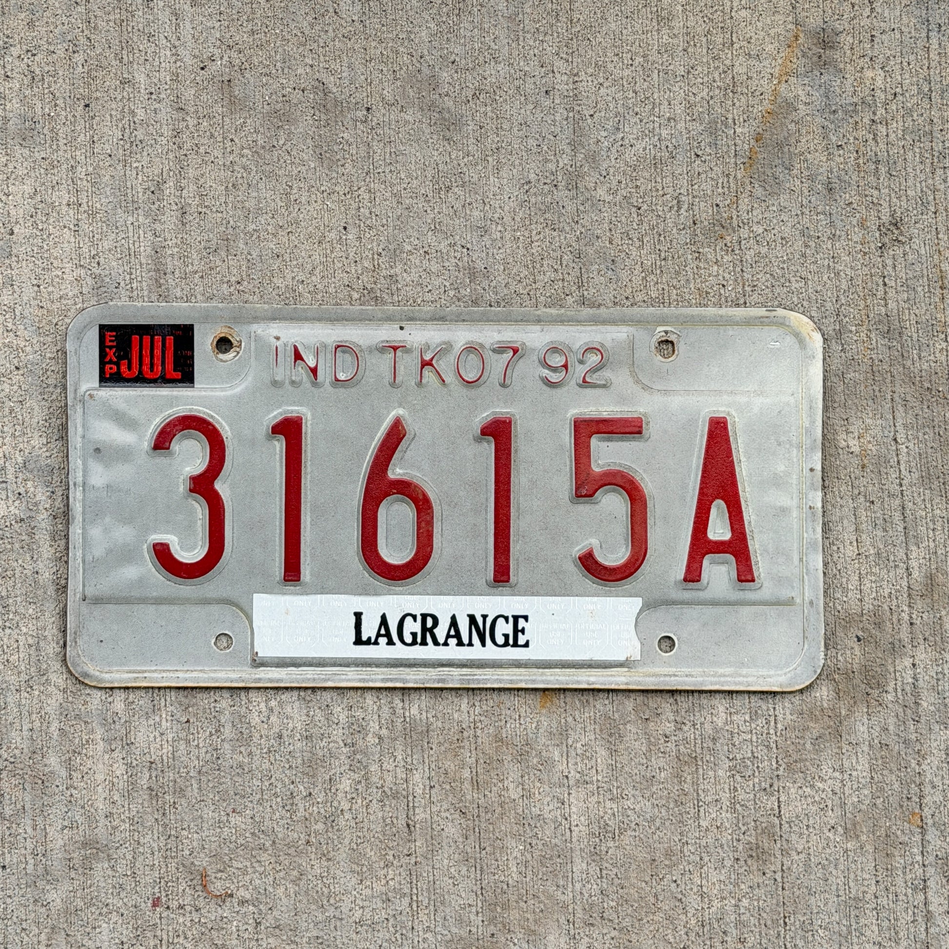 Photo of a 1992 Indiana Truck License Plate Auto Tag Garage Decor Vintage 31615 A with original patina