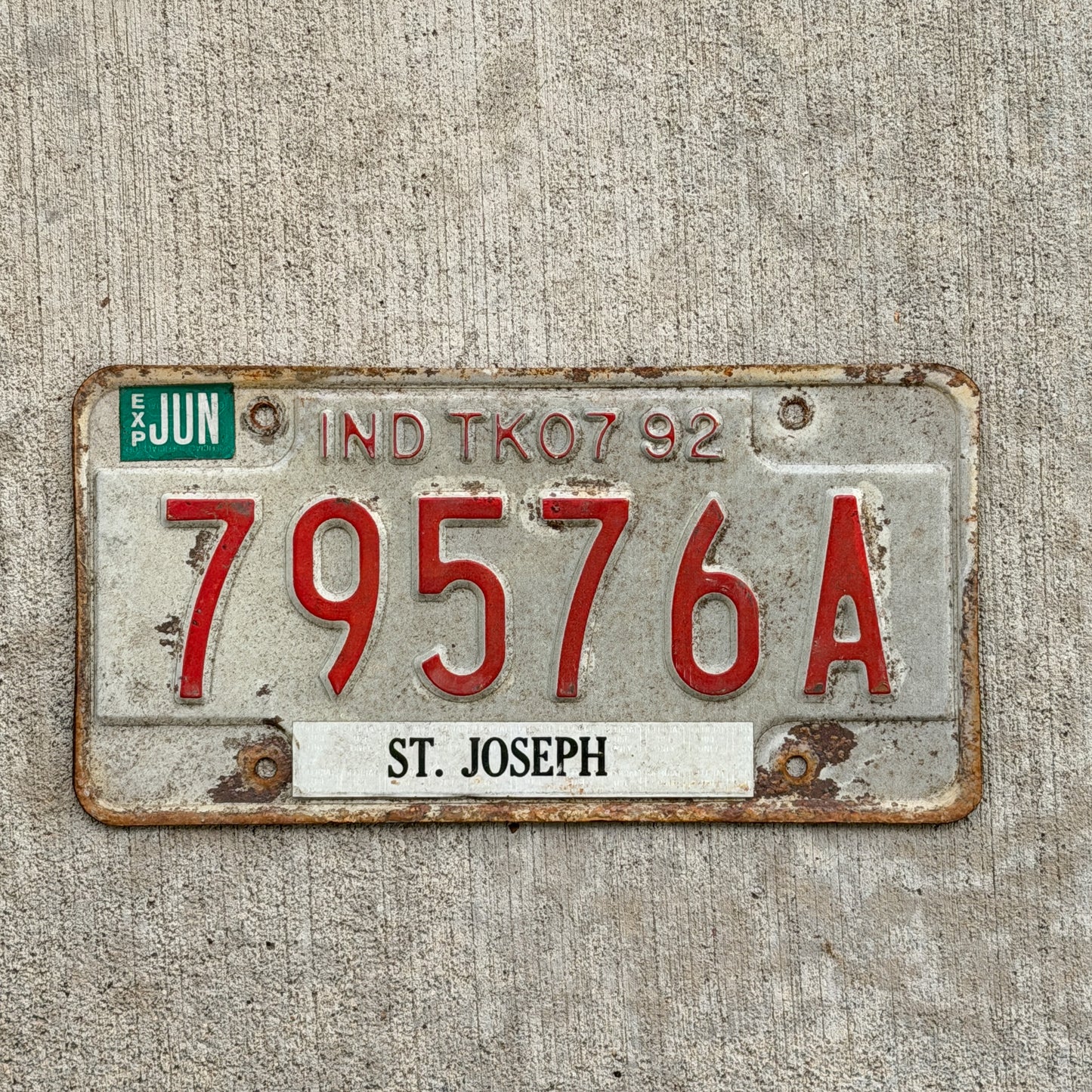 Photo of a 1992 Indiana Truck License Plate Auto Tag Garage Decor Vintage 79576 A with original patina