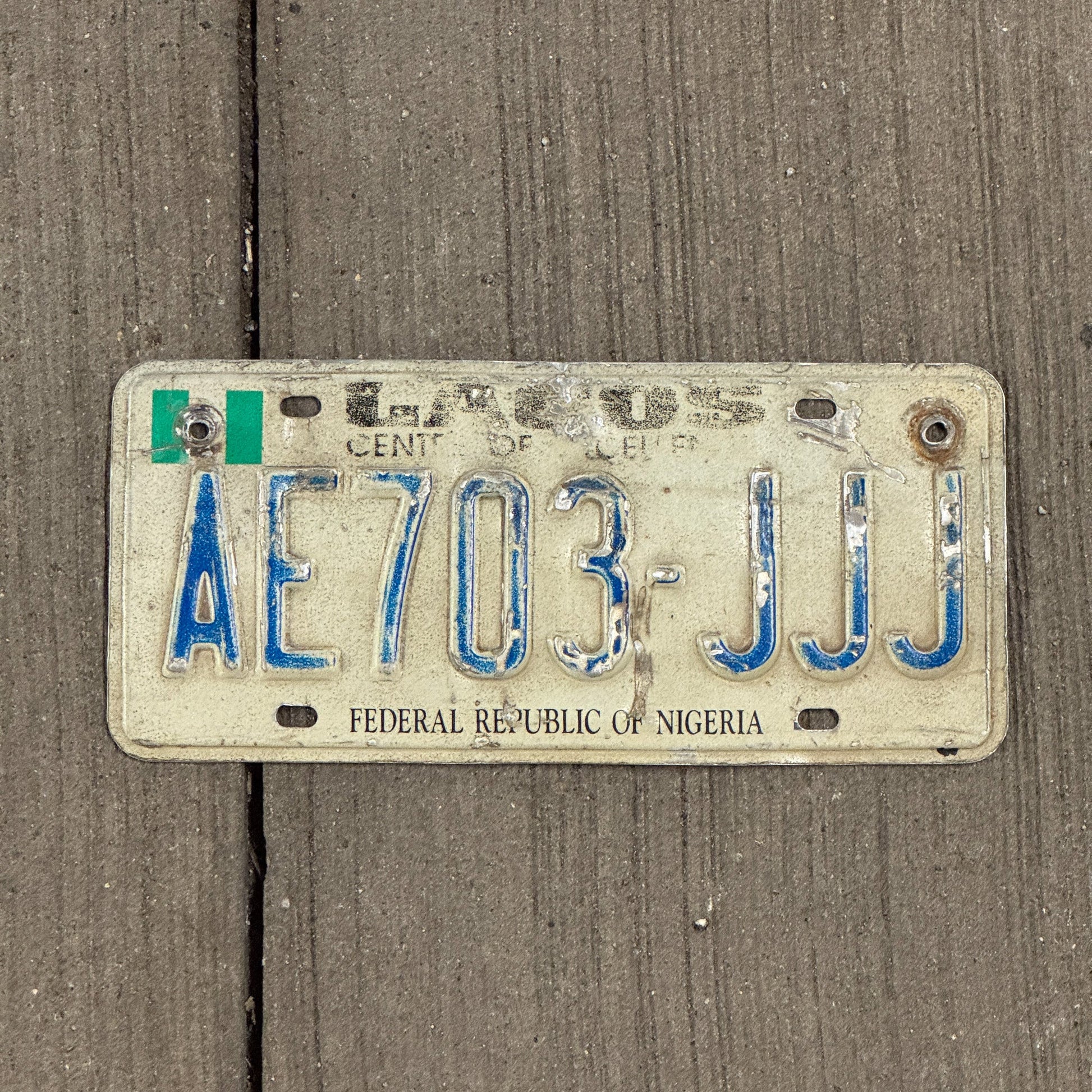 Photo of a 1992 Nigeria License Plate Auto Tag Garage Decor Vintage Repeat Repeating Lagos AE 703 JJJ
