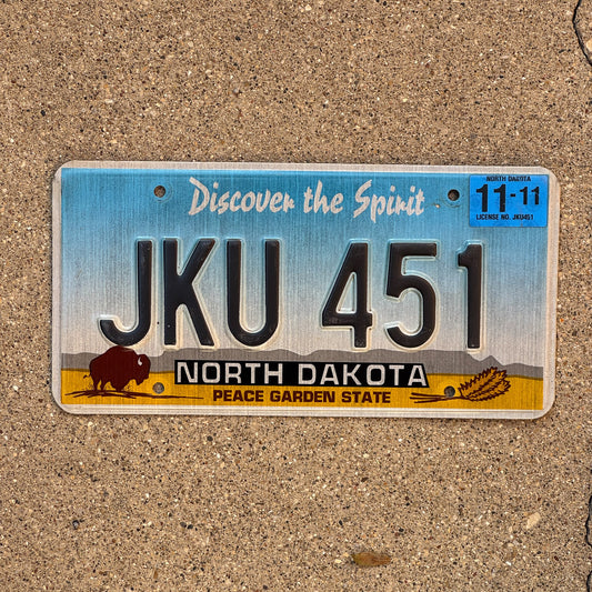 Photo of a 1993 2011 North Dakota License Plate Auto Tag Garage Decor Vintage JKU 451