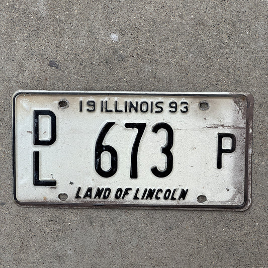 Photo of a 1993 Illinois Dealer License Plate Auto Tag 2 Vintage Garage Merritt's Sterling Ford Mercury Lincoln Dealer 673 P with original patina