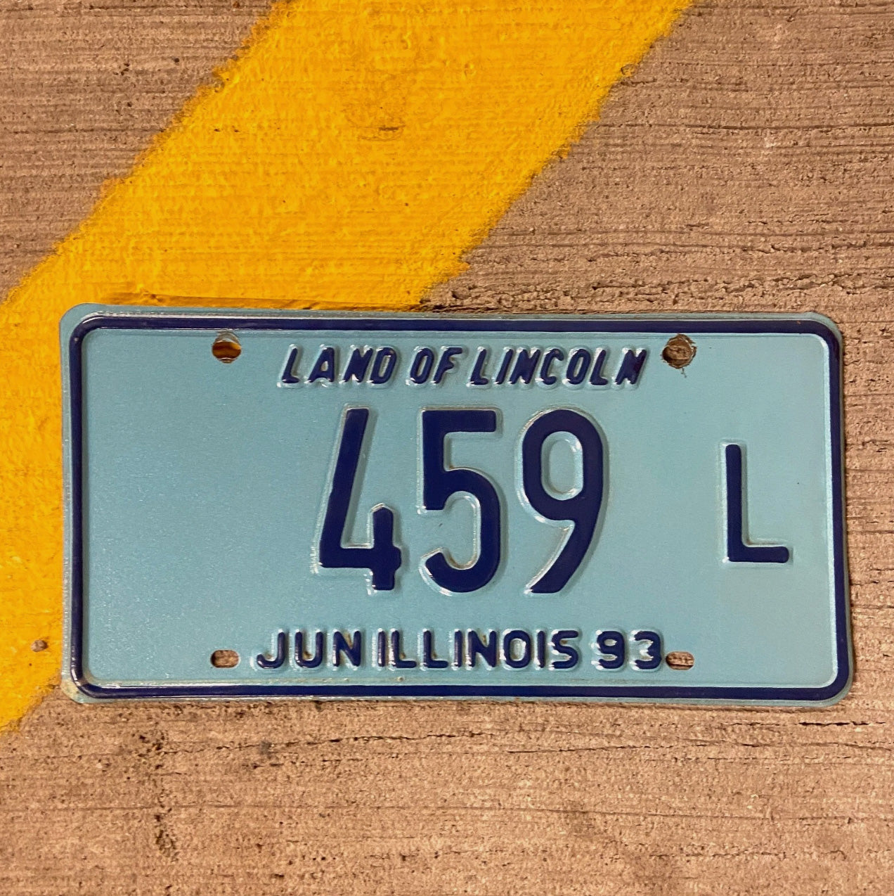 Photo of a 1993 Illinois Truck License Plate Auto Tag Garage Decor Vintage 459 L with original patina
