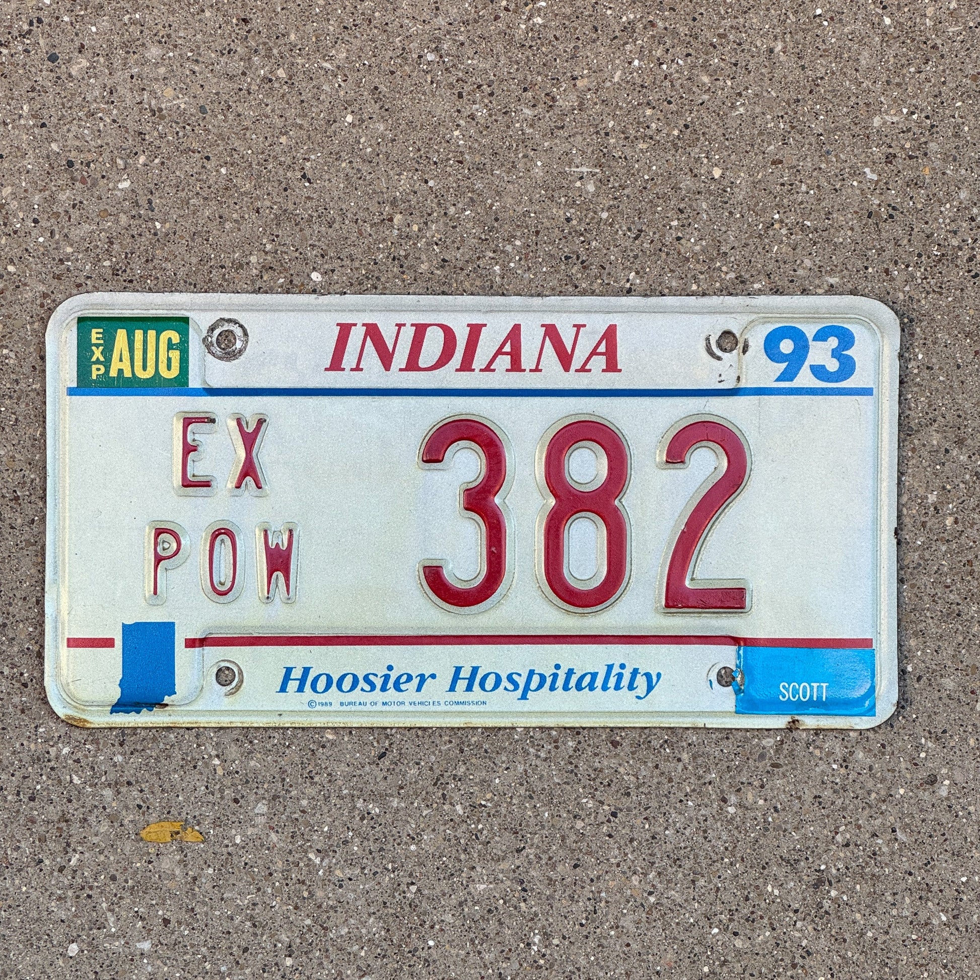 Photo of a 1993 Indiana Ex Prisoner of War License Plate Auto Tag Garage Decor Vintage POW 382 with original patina