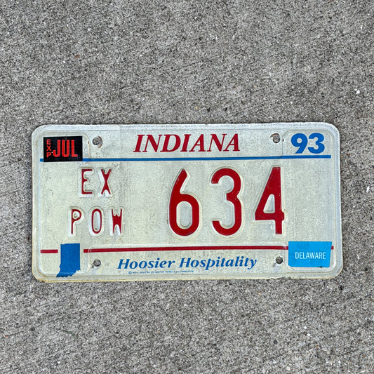Photo of a 1993 Indiana Ex Prisoner of War License Plate Auto Tag Garage Decor Vintage POW 634 with original patina