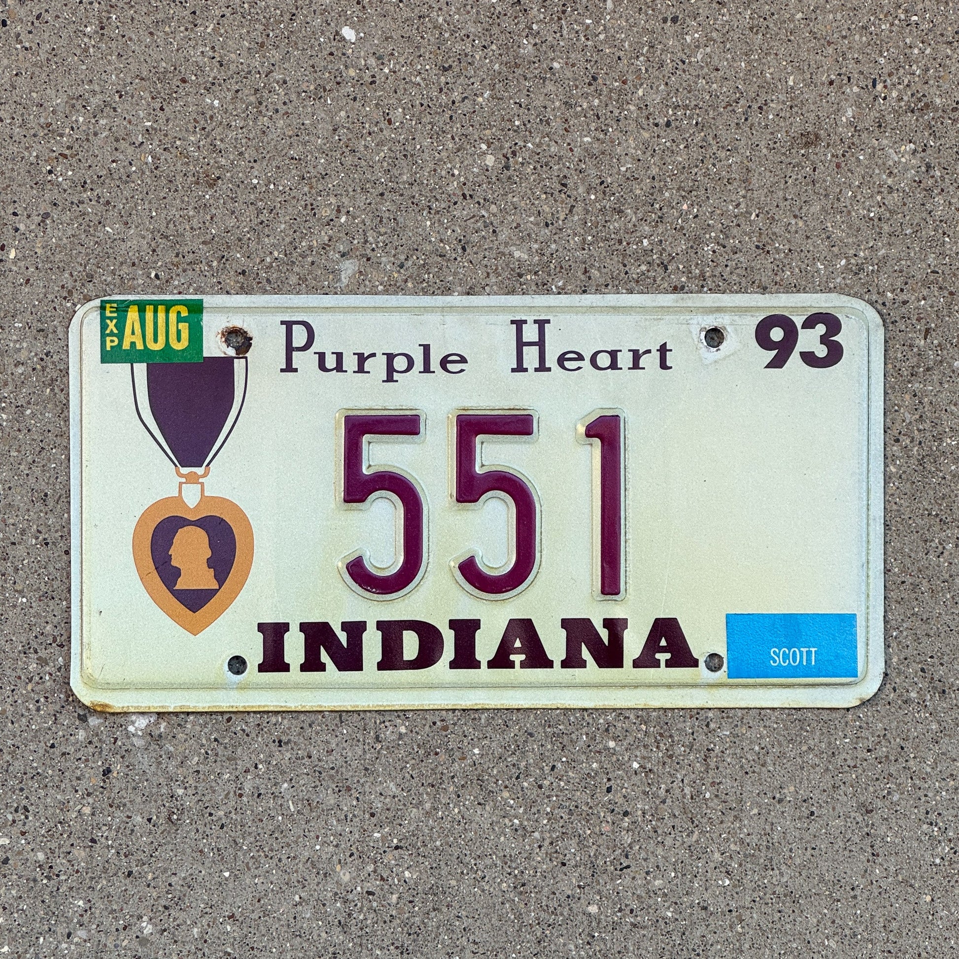 Photo of a 1993 Indiana Military License Plate Auto Tag Garage Decor Vintage Purple Heart 551 with original patina