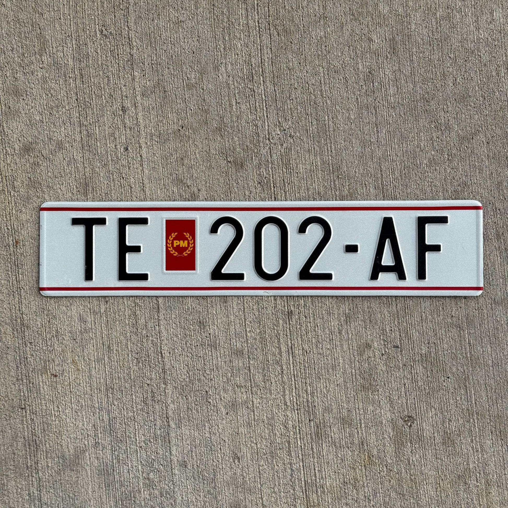Photo of a 1993 Macedonia License Plate Auto Tag Garage Decor Vintage Tetovo TE 202 AF with original patina