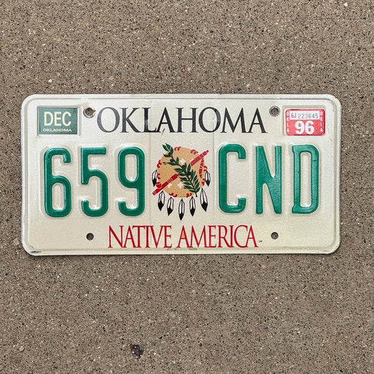 Photo of a 1994 1996 Oklahoma License Plate Auto Tag Garage Decor Vintage Native America 659 CND with original patina