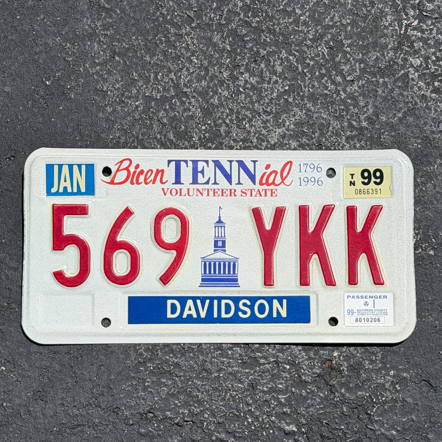 Photo of a 1994 1999 Tennessee License Plate Auto Tag Garage Decor Vintage 569 YKK with original patina