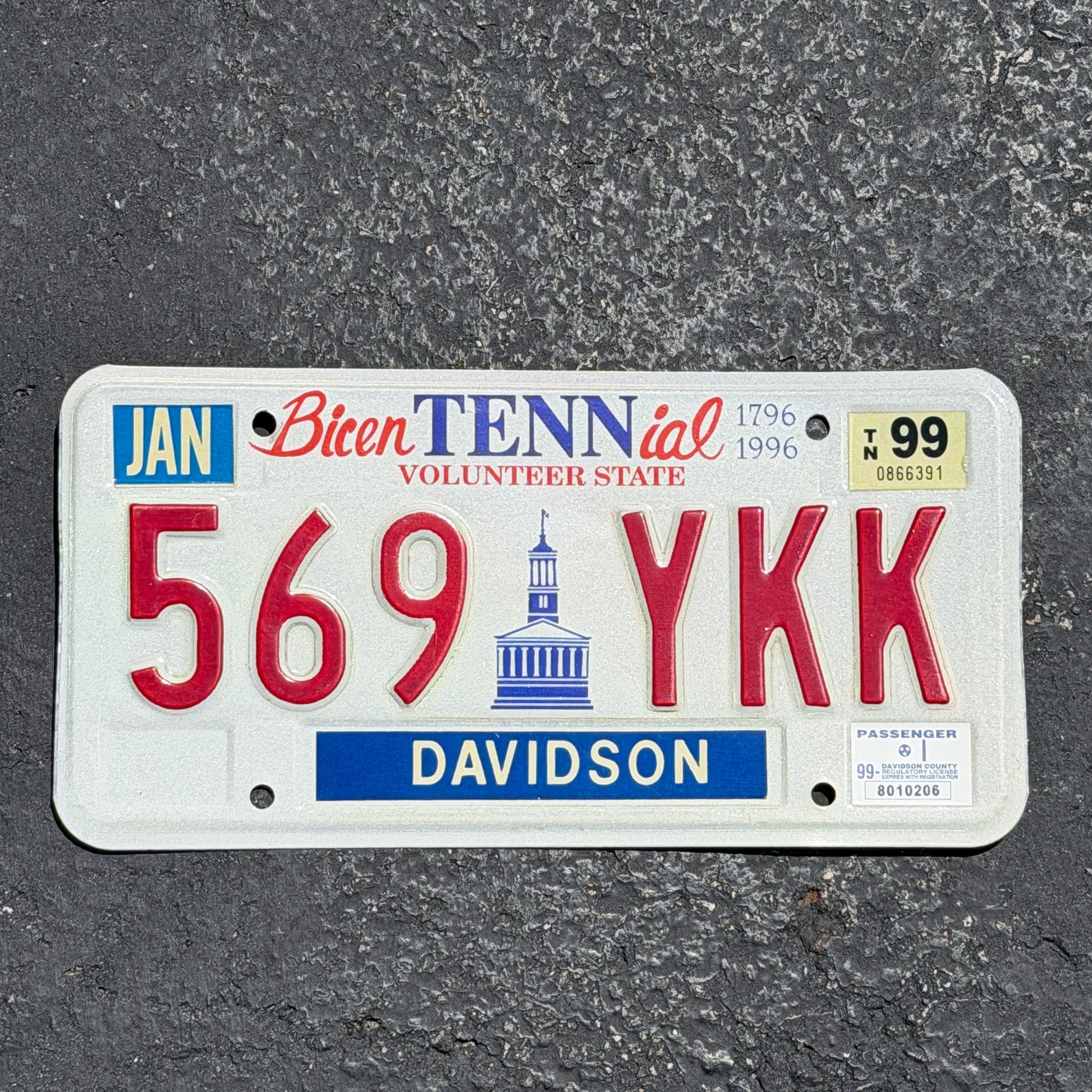 Photo of a 1994 1999 Tennessee License Plate Auto Tag Garage Decor Vintage 569 YKK with original patina