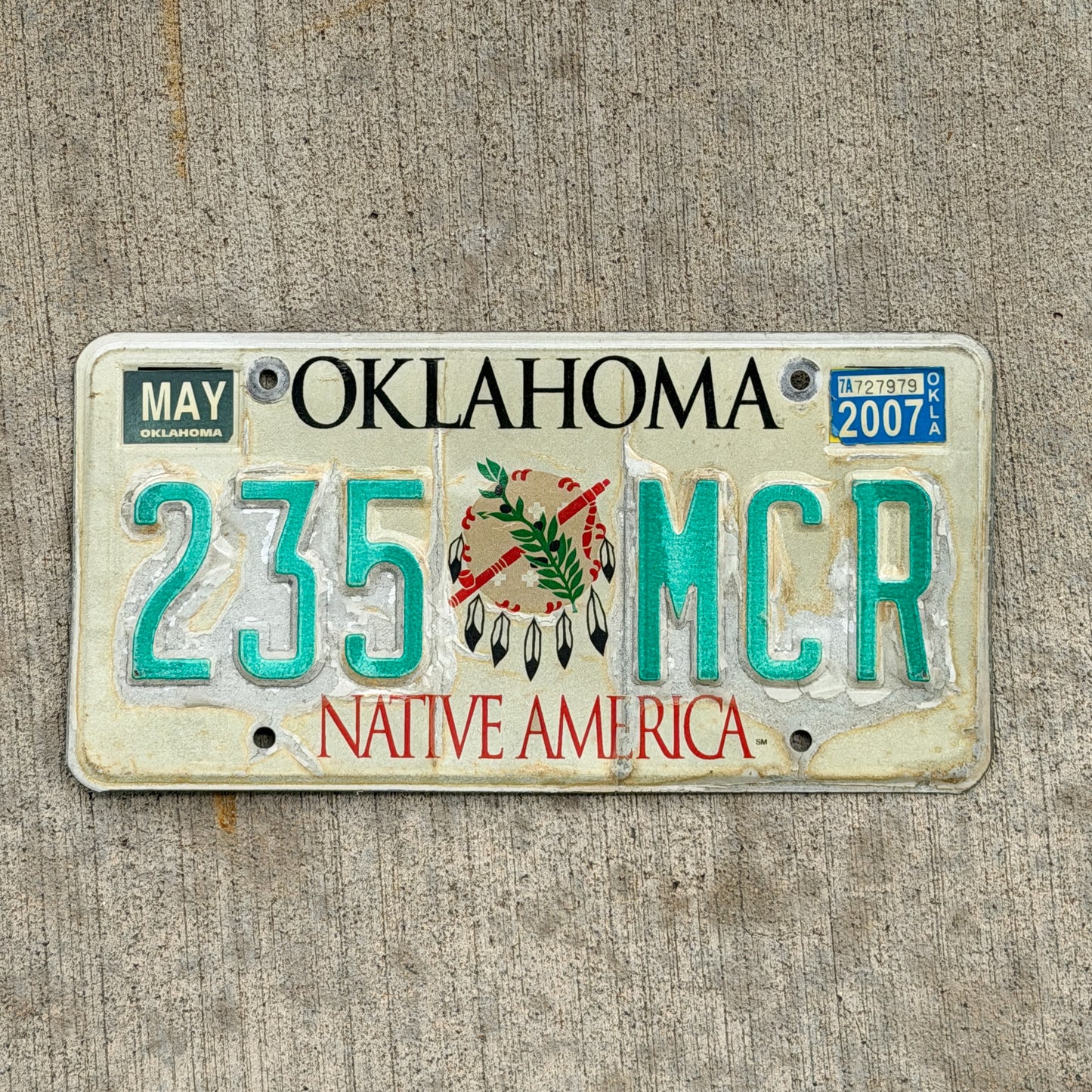 Photo of a 1994 2007 Oklahoma License Plate Auto Tag Garage Decor Vintage Native America 235 MCR with original patina